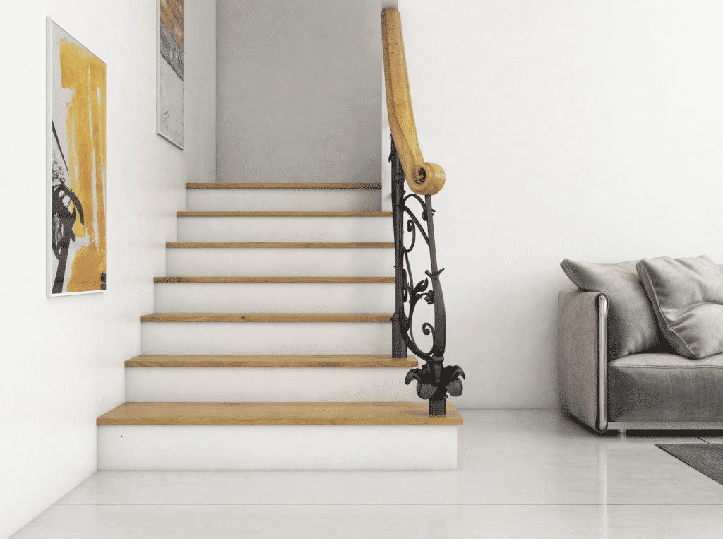 decorar pared escalera cuadros