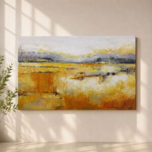 Descubre cómo luce el cuadro Campiña de Teba en un salón moderno. Una obra abstracta de paisaje en tonos dorados, ocres y grises, perfecta para aportar elegancia y personalidad a la decoración de interiores.